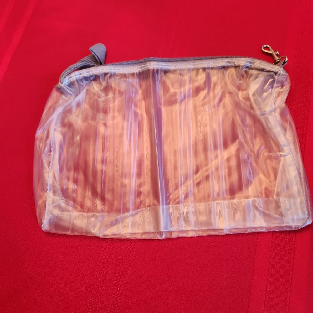 Source Unknown Clear PVC Cosmetic Pouch with Pink Lining